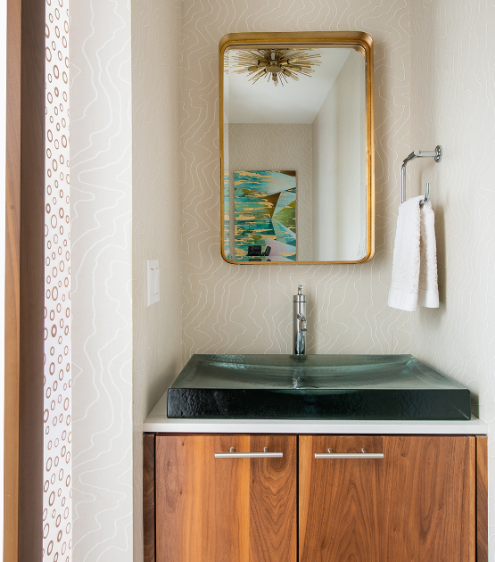One of our favorite bathroom designs ever. All the shapes are well-defined, even in the wallpaper. A collection of unique elements working together famously. Photo courtesy of: Lauren Pressey